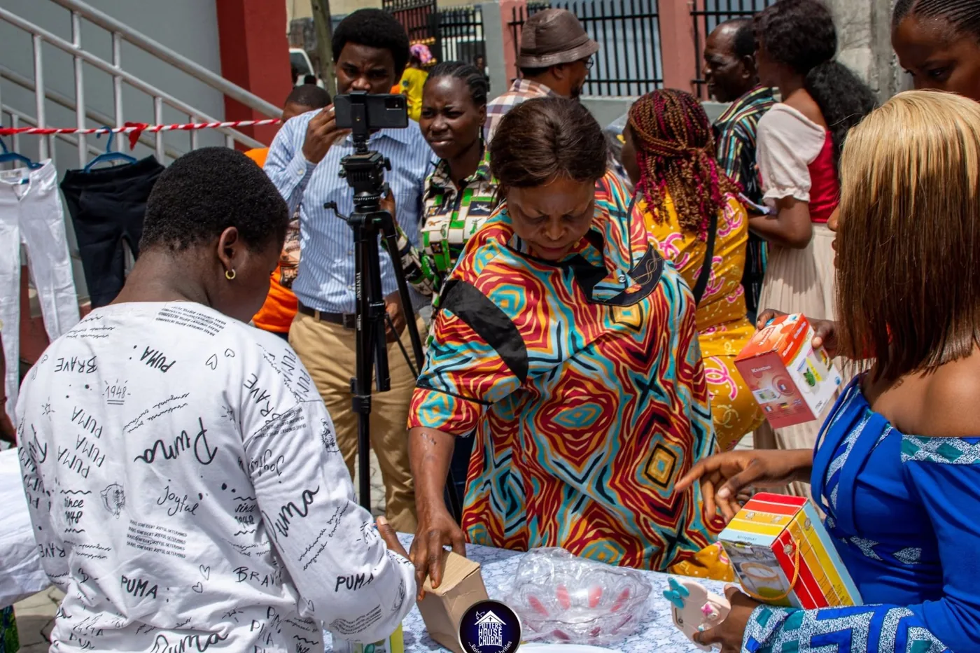 Community members participating in distribution during the Delta State outreach