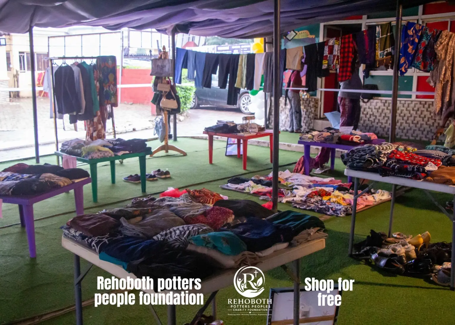 Clothes, shoes and bags displayed at the Shop for Free outreach